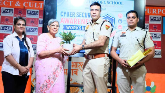 Cyber Cell officials conducting a Cyber Security Awareness Workshop for students at Faridabad Model School.