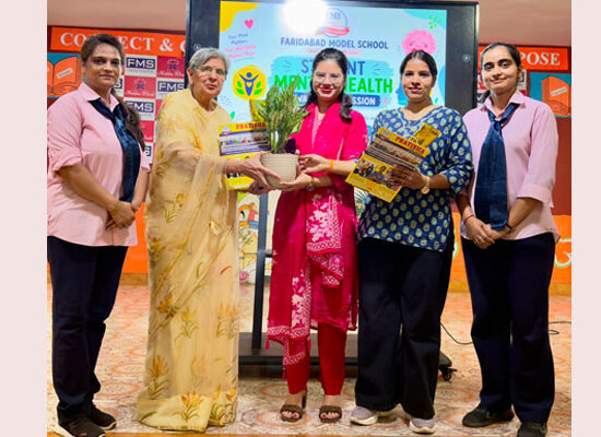 Mental health professionals interacting with students during the Mental Well-Being Seminar at Faridabad Model School.