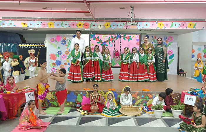 DAV NH-3 NIT Faridabad students in traditional attire celebrating Teej festival with Haryanvi tableaus.
