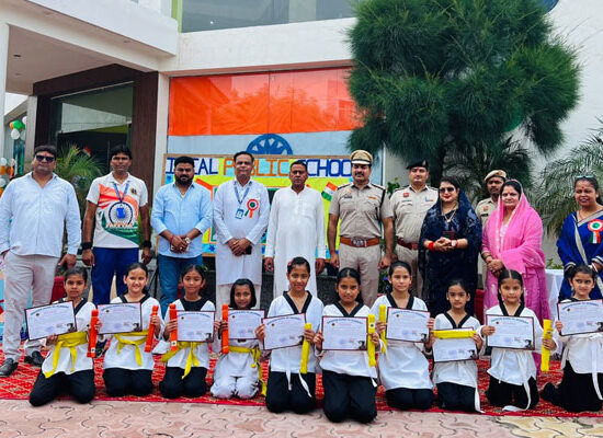 Independence Day celebration at Ideal Public School Agwanpur with students, guests and Taekwondo girls