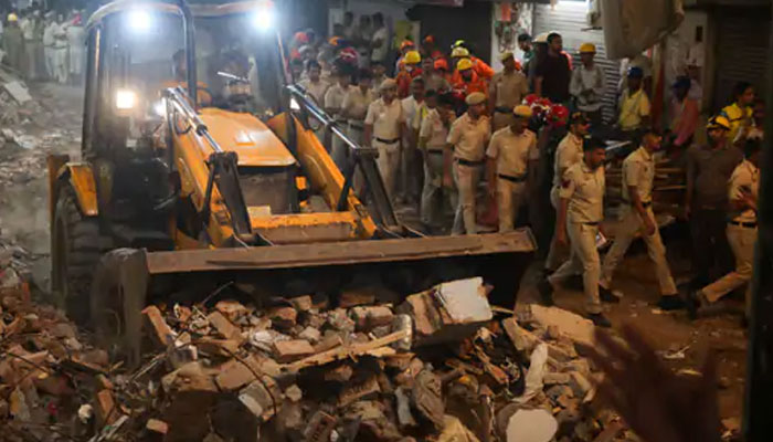 Rescue operation at Delhi Satya Niketan PG building collapse site as NDRF teams search through debris
