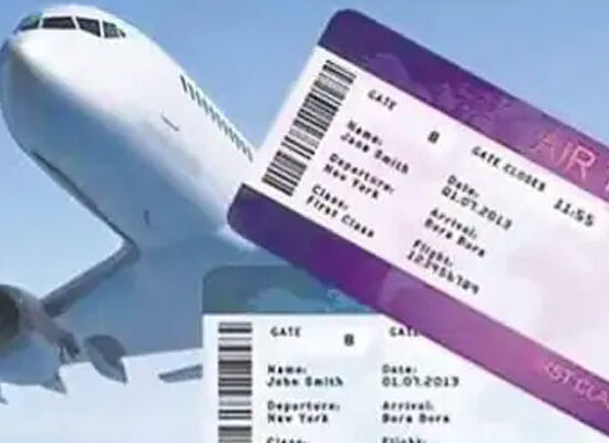 Airline passengers at an airport as the government plans new rules for airfares in India.