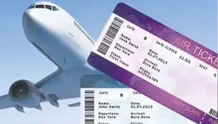 Airline passengers at an airport as the government plans new rules for airfares in India.
