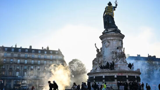 Burning buildings and damaged streets during violent anti-government protests in France