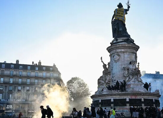 Burning buildings and damaged streets during violent anti-government protests in France