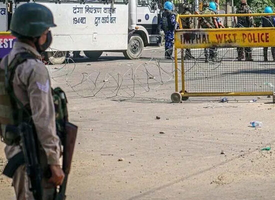 Security personnel outside the Manipur Chief Minister's residence during a protest following fresh violence in the state